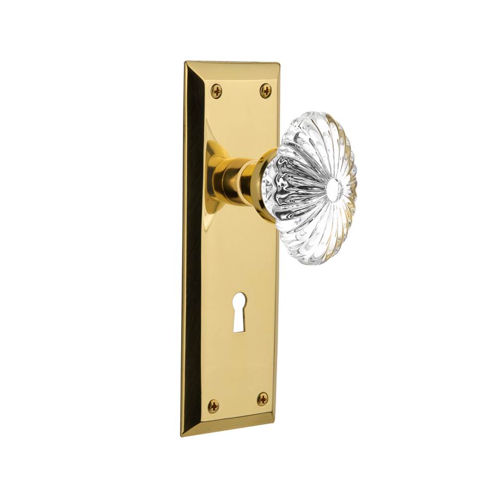 Nostalgic Warehouse Nostalgic Warehouse New York Plate with Keyhole Passage Oval Fluted Crystal Glass Door Knob in Unlacquered Brass